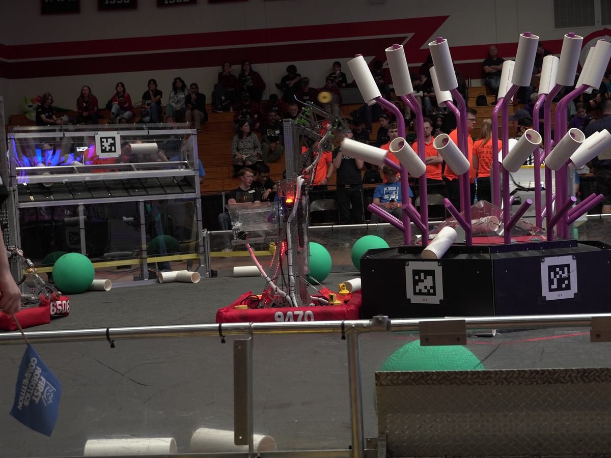Team 9470 robot competing on the field